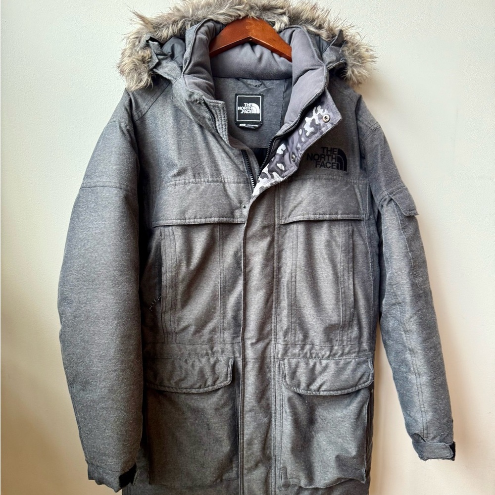 North Face McMurdo parka size small (men’s).  Totally waterproof and windproof.